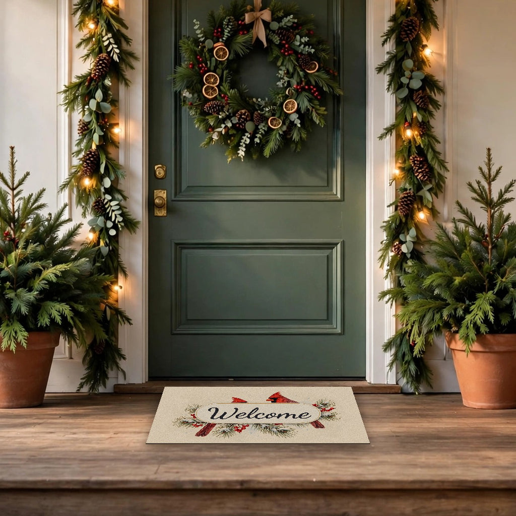 Cardinals on a Snowy Pine Branch Welcome Doormat at a front door