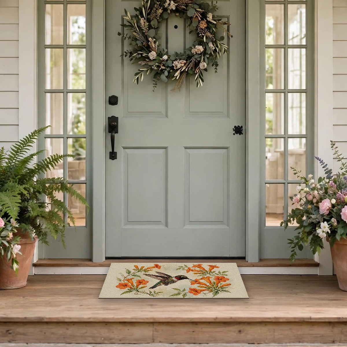 Hummingbird and Trumpet Flowers Doormat at a front door