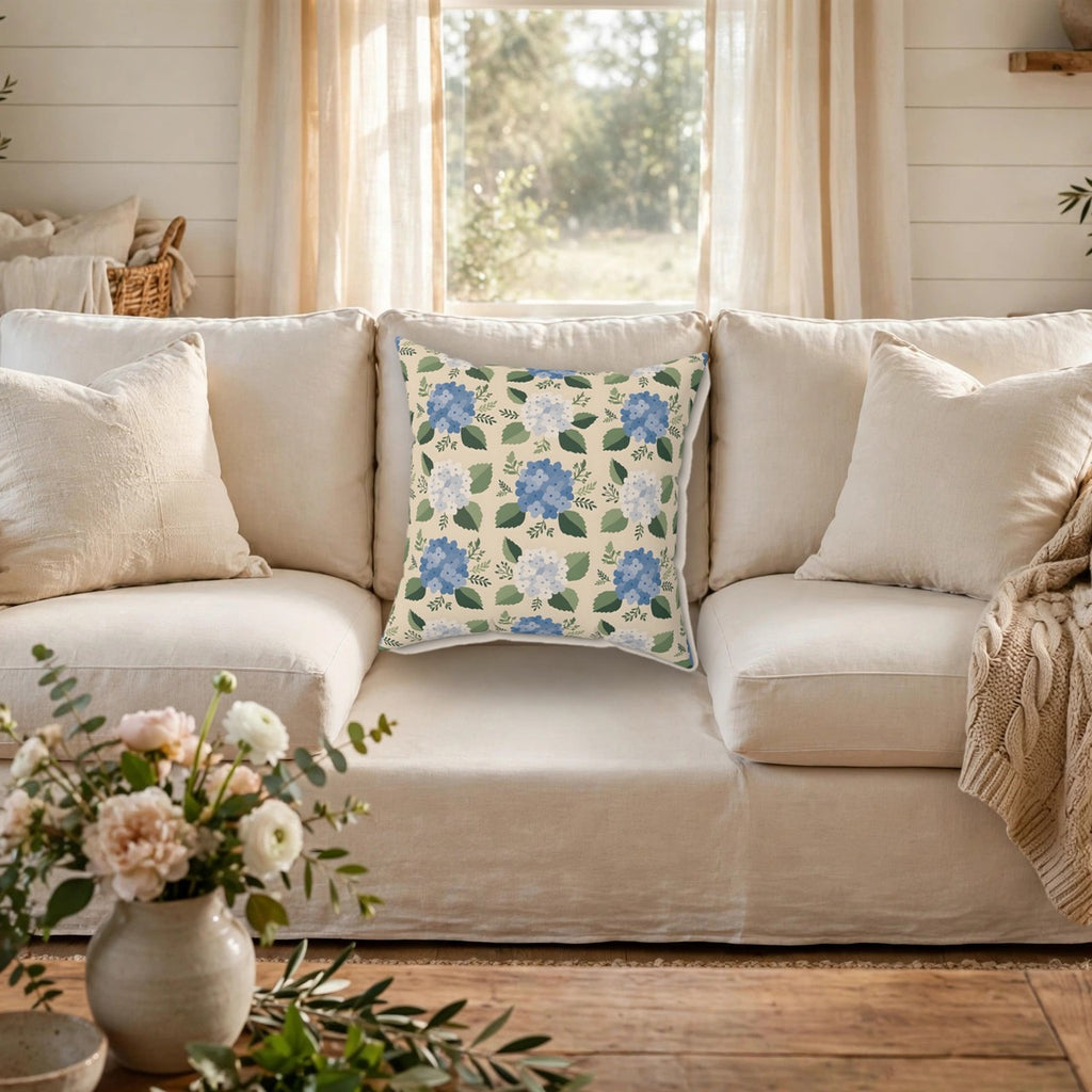 Hydrangea Blue Floral Pattern Throw Pillow on a cozy sofa