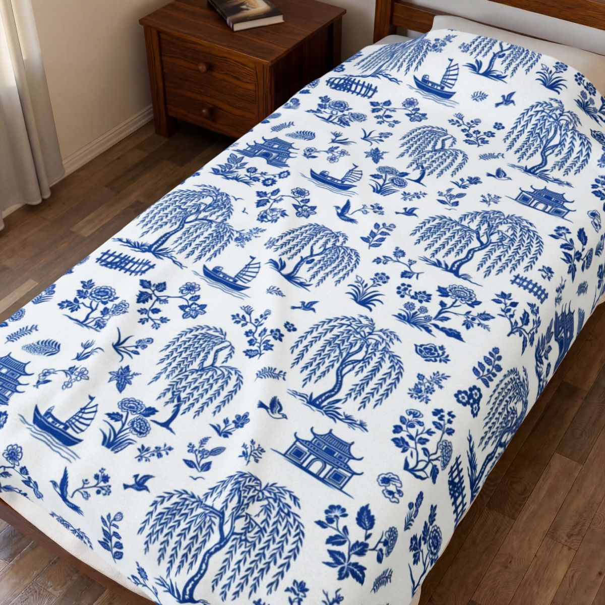 Blue Willow China Pattern Velveteen Plush Blanket spread on a bed