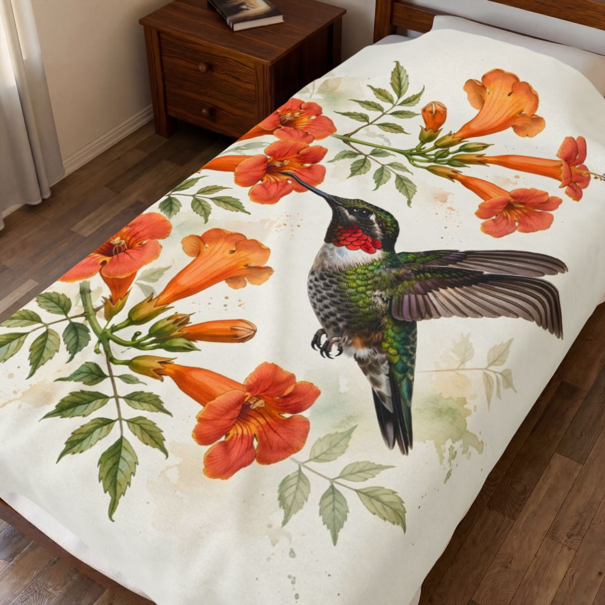 Hummingbird and Trumpet Flowers Velveteen Plush Blanket spread on a bed