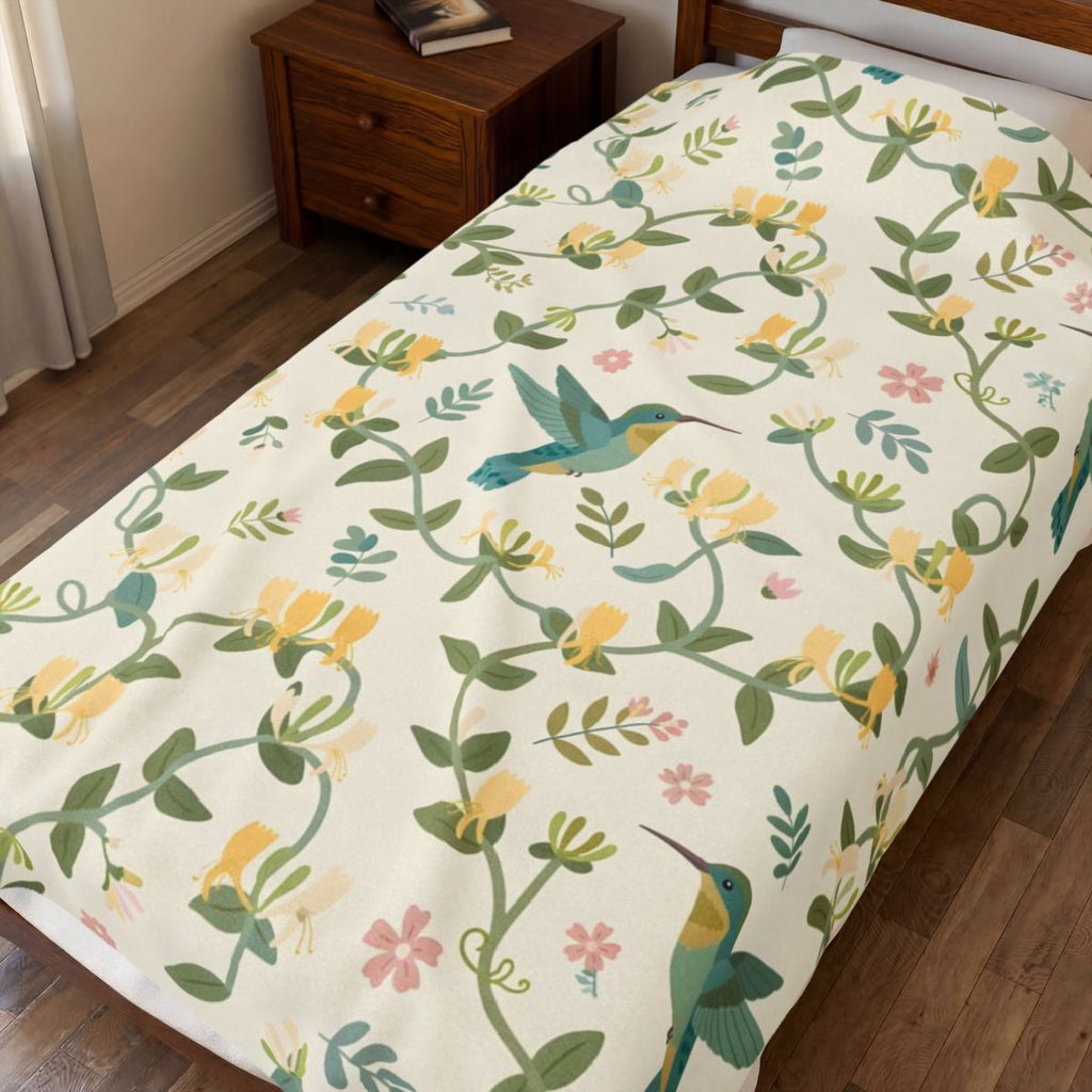 Hummingbirds and Honeysuckle Pattern Velveteen Plush Blanket – Style 2 spread on a bed