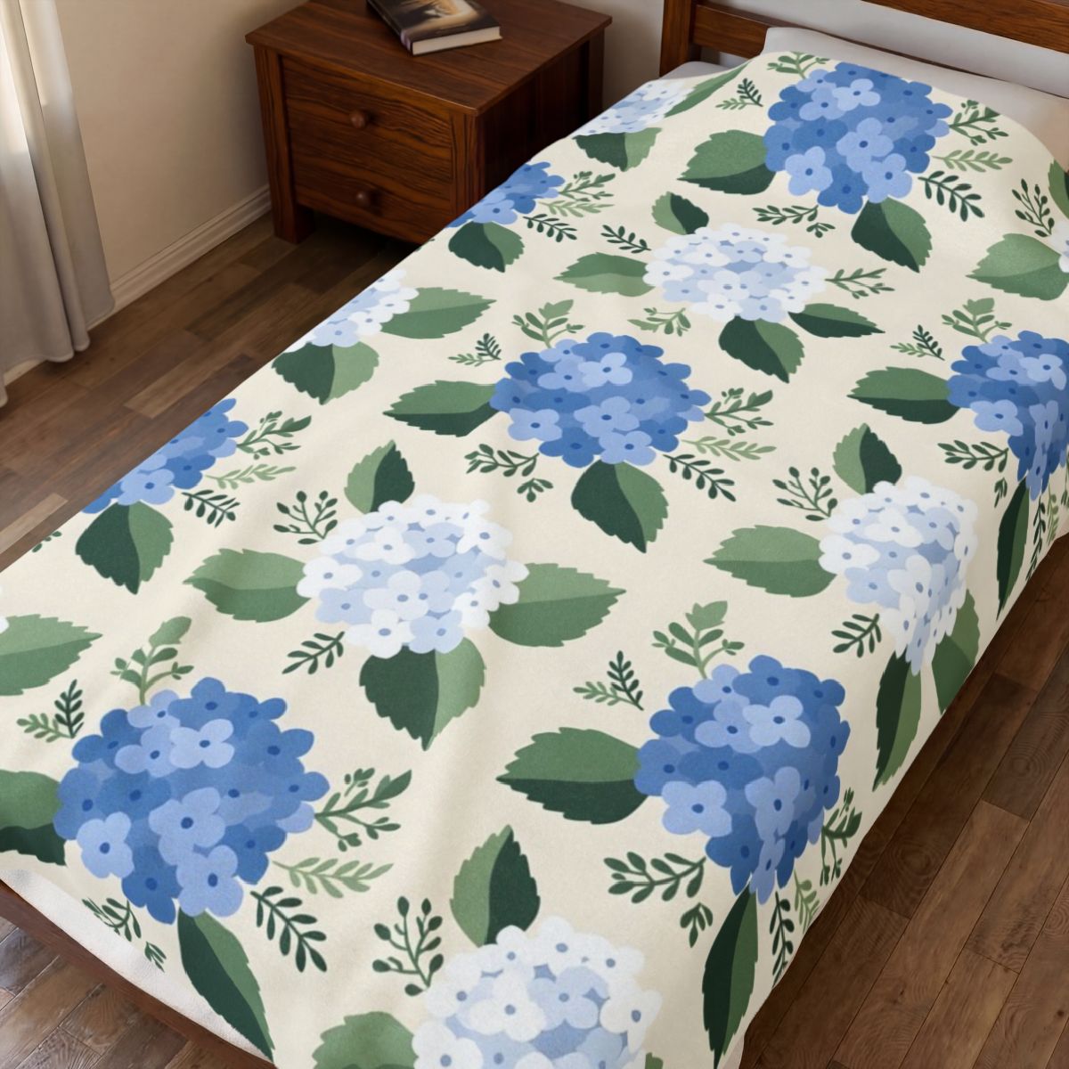 Hydrangea Blue Floral Pattern Velveteen Plush Blanket spread on a bed